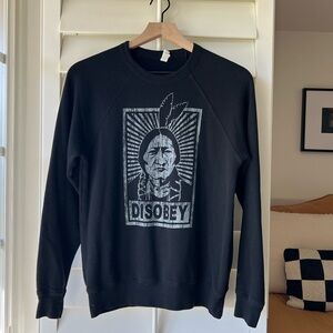 Black casual crewneck sweatshirt. 
Super comfy & warm. Purchased in New Mexico.